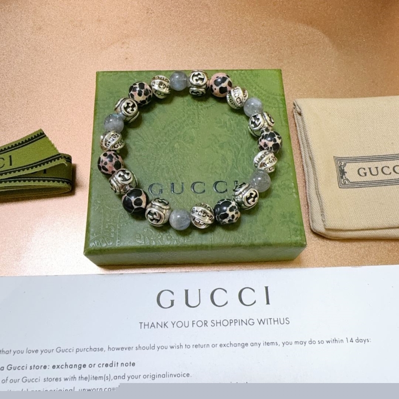 G*u*i bracelets